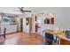 Bright living room with hardwood floors and many windows at 4062 S Shade Ave, Sarasota, FL 34231