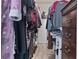 Walk-in closet with ample hanging space, shelving, and drawers for optimal organization and storage at 4630 56Th E Dr, Bradenton, FL 34203