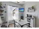 Dining area with window to outside and television for enjoyment at 4630 56Th E Dr, Bradenton, FL 34203