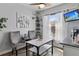 Dining area with lots of natural light with window and hanging plants at 4630 56Th E Dr, Bradenton, FL 34203