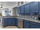Updated kitchen features stainless steel appliances and granite countertops at 4630 56Th E Dr, Bradenton, FL 34203