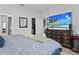 Bright main bedroom with closet and television at 4630 56Th E Dr, Bradenton, FL 34203