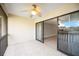 Enjoy seamless indoor-outdoor living on this condo's patio, complete with a ceiling fan and water views at 5187 Lake Village Dr # 4, Sarasota, FL 34235