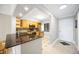 Eat-in kitchen with granite counters, stainless appliances, and tile flooring at 5187 Lake Village Dr # 4, Sarasota, FL 34235
