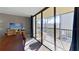 Balcony with outdoor seating, tile floor, and serene view of the surrounding neighborhood at 5611 Gulf Of Mexico Dr # 5, Longboat Key, FL 34228