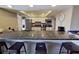 Well-equipped kitchen with granite counters, stainless steel appliances, and ample cabinet space at 5611 Gulf Of Mexico Dr # 5, Longboat Key, FL 34228