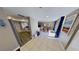Open-concept living space with kitchen, dining, and living areas under recessed lighting at 5611 Gulf Of Mexico Dr # 5, Longboat Key, FL 34228