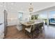Open kitchen layout with a large island, seating, ample cabinetry, and stainless steel appliances at 870 N Shore Dr, Anna Maria, FL 34216