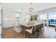 Kitchen view featuring a large island with seating, and stainless steel appliances at 870 N Shore Dr, Anna Maria, FL 34216