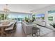 Coastal living room with ocean views, modern furniture, and decor at 870 N Shore Dr, Anna Maria, FL 34216