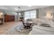 Cozy living room features tile floors, stylish furnishings, and natural light at 927 Lemon Bay Dr, Venice, FL 34293