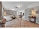 Comfortable living room with neutral colors, tile flooring, and round dining table at 927 Lemon Bay Dr, Venice, FL 34293