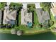 Aerial view showcasing properties with backyard pools and scenic water views at 13324 Purple Finch Cir, Lakewood Ranch, FL 34202