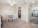 Charming dining room with open access to the kitchen and living room at 2345 Felicity Pl, North Port, FL 34289