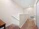 Carpeted staircase leading upstairs to the bedrooms at 2345 Felicity Pl, North Port, FL 34289