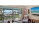 Balcony with outdoor seating and stunning water views at 4234 Gulf Of Mexico Dr # E2, Longboat Key, FL 34228