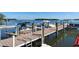 Waterfront property with a private dock perfect for boating and enjoying scenic water views at 4234 Gulf Of Mexico Dr # E2, Longboat Key, FL 34228