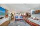 Bright and airy living space connecting to a kitchen and featuring stylish decor and comfortable seating at 4234 Gulf Of Mexico Dr # E2, Longboat Key, FL 34228