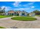 Beautiful single-story home featuring a circular driveway and a separate garage at 5750 Saddle Oak Trl, Sarasota, FL 34241