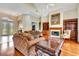 Inviting living room with fireplace and elegant furniture at 5750 Saddle Oak Trl, Sarasota, FL 34241