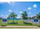 Mirabella community dog park, pickleball courts, and landscaping on a sunny day at 7108 Playa Bella Dr, Bradenton, FL 34209