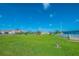 Community playground and dog park in the Mirabella community, under a sunny sky at 7108 Playa Bella Dr, Bradenton, FL 34209