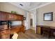Cozy study with wood floors, built-in desk, and plenty of natural light at 7108 Playa Bella Dr, Bradenton, FL 34209
