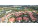 Sprawling aerial view highlighting the community's lush landscaping and beautiful homes at 7344 Villa D Este Dr, Sarasota, FL 34238