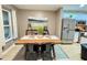 Bright dining area with a large window and views to the kitchen at 8811 White Sage Loop # 8811, Lakewood Ranch, FL 34202