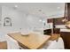 Modern dining area with a kitchen view and large wooden table at 214 S Westland Ave # 1, Tampa, FL 33606