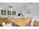 Bright dining room features a large wooden table, and seating for six at 214 S Westland Ave # 1, Tampa, FL 33606