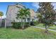 Two-story house with gray and beige siding and landscaping at 214 S Westland Ave # 1, Tampa, FL 33606