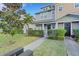 Two-story house with gray and beige siding at 214 S Westland Ave # 1, Tampa, FL 33606