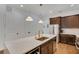 Large kitchen island with marble countertop and a copper sink at 214 S Westland Ave # 1, Tampa, FL 33606