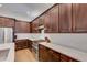 Modern kitchen with dark wood cabinets and white quartz countertops at 214 S Westland Ave # 1, Tampa, FL 33606