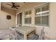 Small patio with a table and chairs next to the house at 214 S Westland Ave # 1, Tampa, FL 33606