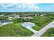 Aerial view of the house, showcasing its position in a quiet residential area at 9245 Zorn St, Port Charlotte, FL 33981