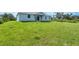 House with a large grassy backyard at 9245 Zorn St, Port Charlotte, FL 33981