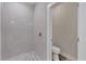 Bathroom with walk-in shower and toilet at 9245 Zorn St, Port Charlotte, FL 33981