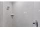 Modern shower with clean white tile and chrome fixtures at 9245 Zorn St, Port Charlotte, FL 33981