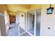 Open door revealing tiled entry and hallway at 1 Colony Point Dr # 5C, Punta Gorda, FL 33950
