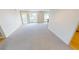 Spacious living room with carpeting and water views at 1 Colony Point Dr # 5C, Punta Gorda, FL 33950