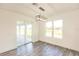 Dining area featuring wood floor and sliding glass doors at 1309 Nackman Rd, North Port, FL 34288