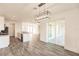 Bright dining area with sliding glass doors leading to patio at 1309 Nackman Rd, North Port, FL 34288