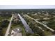 Residential lot on a canal with nearby houses at 9453 Zorn St, Port Charlotte, FL 33981