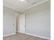 Spacious bedroom with neutral walls and wood-look floors at 9453 Zorn St, Port Charlotte, FL 33981