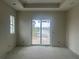 Main bedroom with water view and sliding glass doors at 9453 Zorn St, Port Charlotte, FL 33981