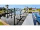 Private boat dock with lift and walkway, perfect for water access at 1424 Grebe Dr, Punta Gorda, FL 33950