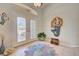 Bright foyer featuring decorative mermaid art at 1429 Blue Jay Ct, Punta Gorda, FL 33950