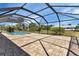 Screened-in pool area with ample deck space at 745 Columbia St, Port Charlotte, FL 33948